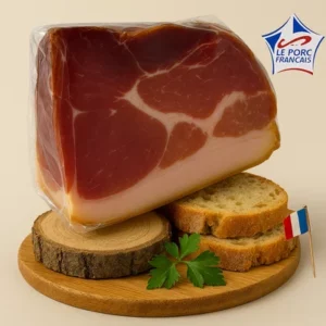alt="Quart de jambon Auvergne 12 mois affiné, posé sur planche en bois avec tranches de pain et persil, logo Le Porc Français en haut à droite"